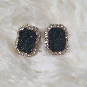 Black and gold statement earrings